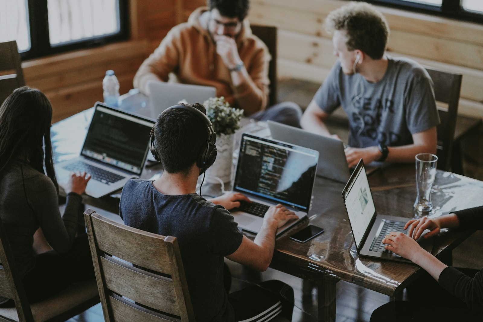 The team collaborating around a table